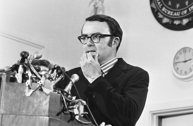 In this May 15, 1973, photo, then-acting FBI director William Doyle Ruckelshaus pauses during a news conference in Washington. In 2008, Time magazine rated Ruckelshaus among the best Cabinet secretaries in U.S. history.