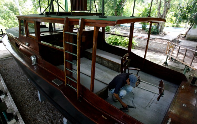 A worker polishes the Pilar, a 40-foot fishing boat that belonged to late American writer Ernest Hemingway (1899-1961) at his former home that is now a museum in Finca Vigia, Cuba, in 2008.