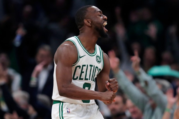Boston Celtics guard Kemba Walker reacts after hitting a 3-pointer late in Boston's 116-106 win over Dallas on Monday in Boston.