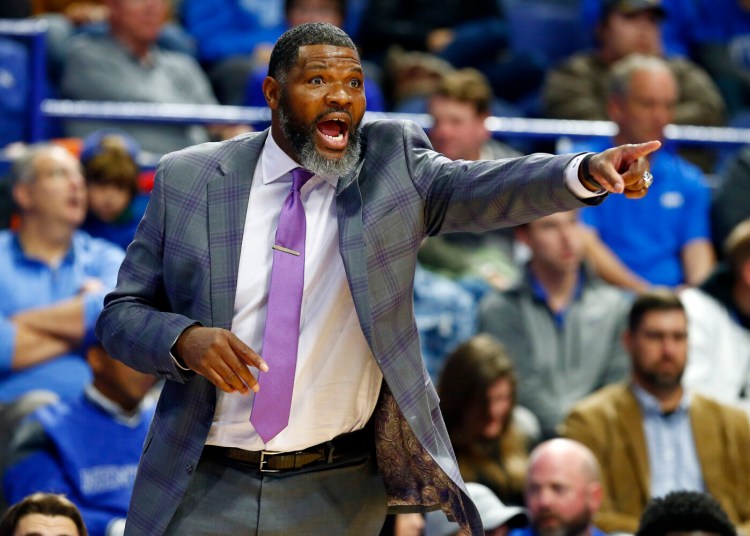 Evansville Coach Walter McCarty, formerly a player with the Celtics, guided his Evansville team to an upset win at top-ranked Kentucky on Tuesday. 