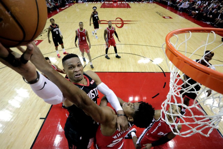 Houston's Russell Westbrook had 38 points, 13 rebounds and 10 assists in the Rockets' 132-108 win over Portland on Monday in Houston.
