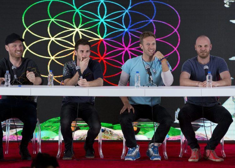 Members of British band Coldplay, from left, Jonny Buckland, Guy Berryman, Chris Martin and Will Champion, participate in a press conference in April 2016 at Foro Sol in Mexico City. 