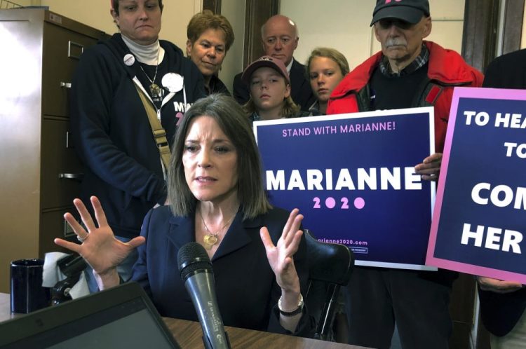 Democratic presidential candidate author Marianne Williamson, shown in November,  has laid off her entire Democratic presidential campaign staff,  a former adviser says.