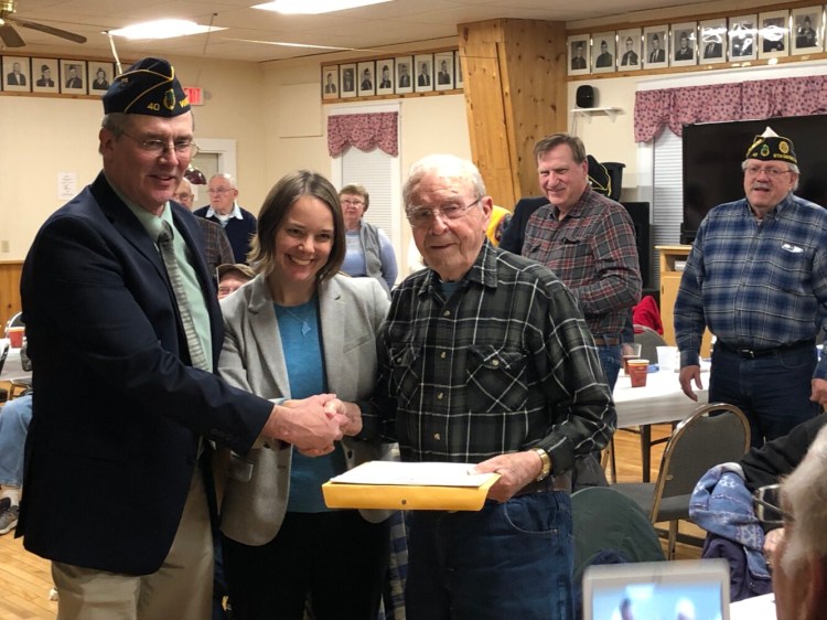 World War II veteran Clifford West was recognized for his service during a special ceremony at Winthrop American Legion Post 40 on Thursday. With West are Post Commander Colin Hewett, Commander and state Sen. Shenna Bellows (D-Manchester).