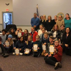 Cape Elizabeth Middle School and High School students and the school board celebrate the students' acceptance into this year's honors festivals.
