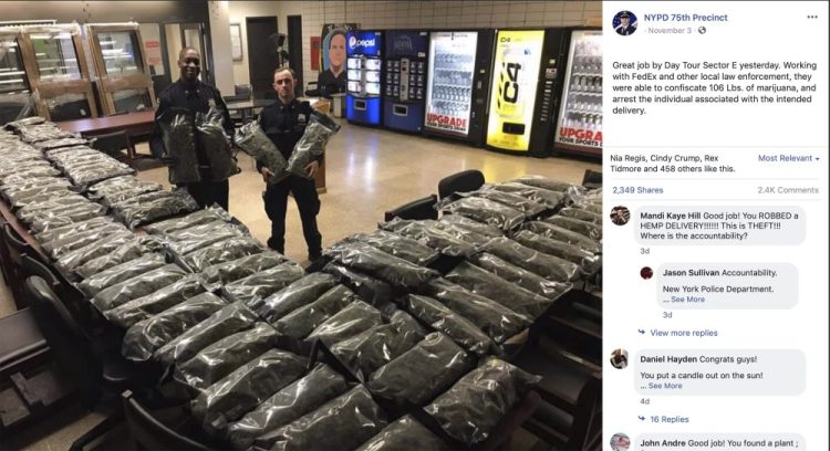 Officers stand by what NYPD thought was marijuana when they confiscated it in the Brooklyn borough of New York on Saturday, at the 75th Precinct of the NYPD in New York. The Vermont farm that grew the plants and the Brooklyn CBD shop that ordered them insist they're not pot but legal industrial hemp.