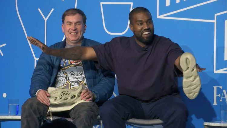 This image taken from video shows Kanye West, right, with Steven Smith, lead designer at Yeezy during a discussion on fashion and design at the Fast Company Innovation Festival in New York on Thursday.