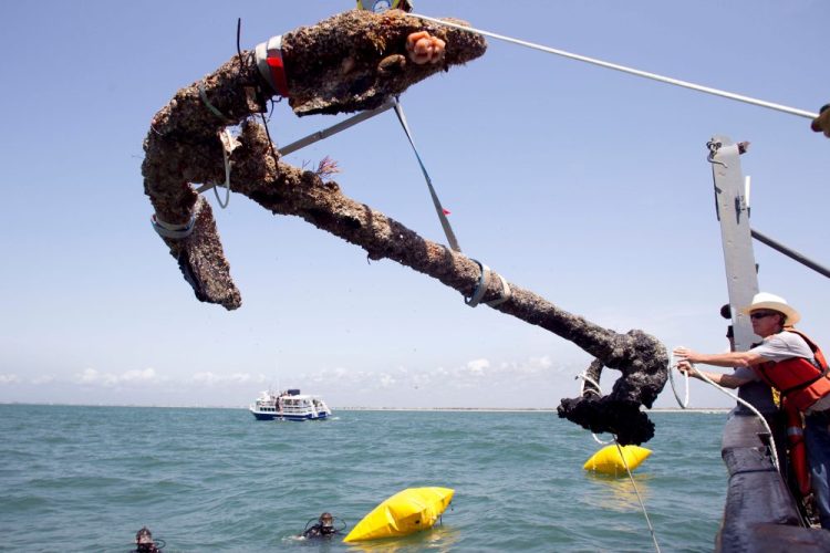A 3,000-pound anchor from what is believed to be the wreck of the pirate Blackbeard's flagship, the Queen Anne's Revenge, is recovered from the ocean where it has been since 1718, in Beaufort Inlet, in Carteret County N.C. , in this May 27, 2011, photo.