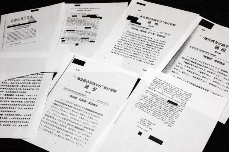 A sample of classified Chinese government documents leaked to a consortium of news organizations is displayed Friday in New York. Beijing has detained more than a million Uighurs, ethnic Kazakhs and other Muslim minorities for what it calls voluntary job training. The confidential documents lay out the Chinese government's deliberate strategy to lock up ethnic minorities to rewire their thoughts and even the language they speak.