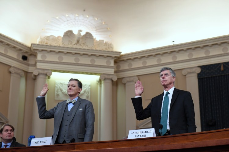 George Kent, left, and William Taylor are sworn in for the House Intelligence Committee impeachment hearing Wednesday on Capitol Hill.