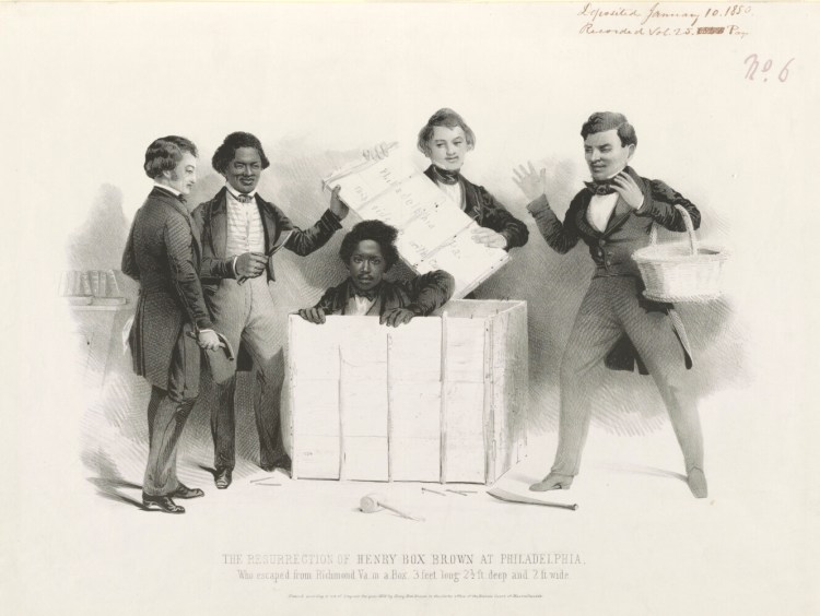 Henry "Box" Brown emerges from a wooden crate after mailing himself to freedom as several people, including abolitionist Frederick Douglass (holding a claw hammer at left) look on. 