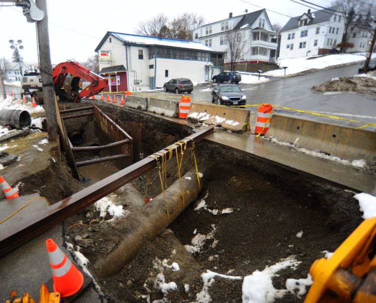 Repair of a broken 30-inch sewer and stormwater lines have squeezed passage on Water Street down to one lane recently. The Kennebec Sanitary Treatment District awaits the delivery of the stormwater pipe on Monday.