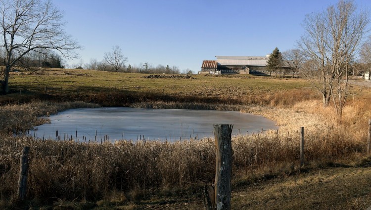 Fencing around a pond Wednesday at Jacobs Cattle Farm in Mount Vernon was funded in part by U.S. Department of Agriculture funds.