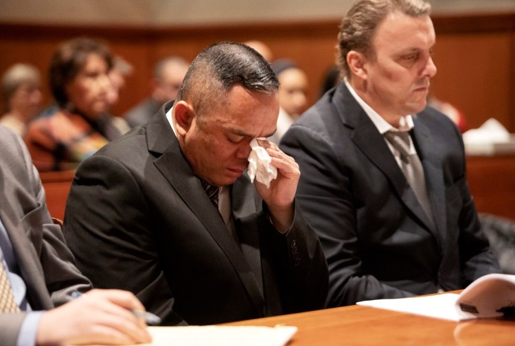 Anthony Leng wipes away tears at his sentencing hearing for the murder of Sohka Khuon, the mother of his children, on Monday. Leng pleaded guilty and was sentenced to 40 years in prison. 