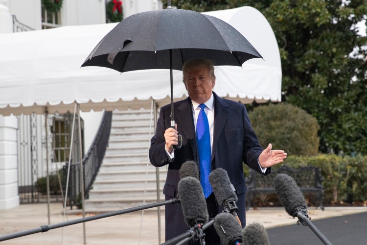 President Donald Trump speaks with reporters on the South Lawn of the White House before departing, Monday, Dec. 2, 2019, in Washington. (AP Photo/Alex Brandon)