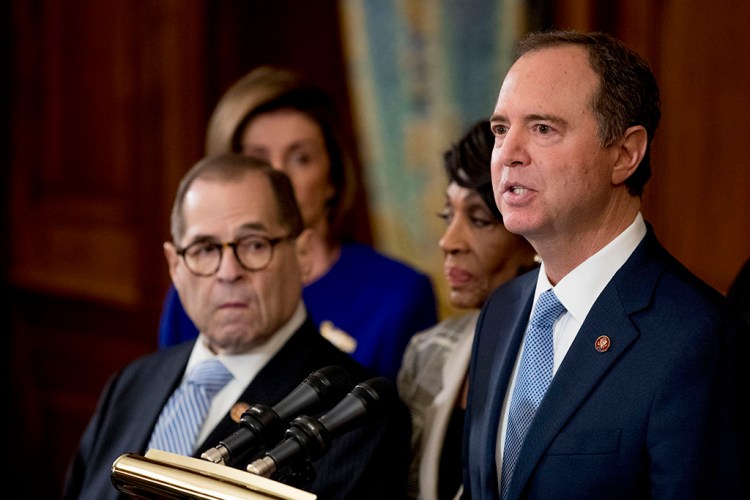 Rep. Adam Schiff, D-Calif., chairman of the House Intelligence Committee, speaks at a news conference Tuesday to announce articles of impeachment against President Trump, charging abuse of power and obstruction of Congress.