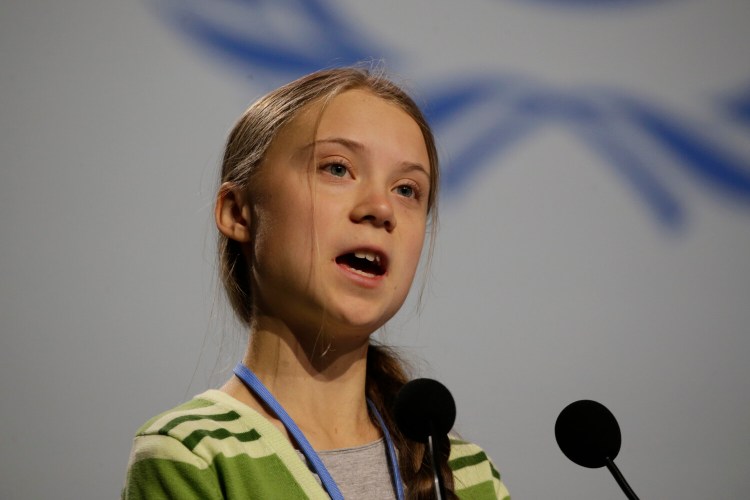 Swedish climate activist Greta Thunberg addresses plenary of U.N. climate conference during with a meeting with leading climate scientists at the COP25 summit in Madrid, Spain, Wednesday, Dec. 11. Thunberg is in Madrid where a global U.N.-sponsored climate change conference is taking place.
