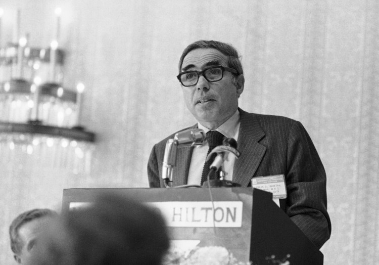 Felix Rohatyn, head of New York's Municipal Assistance Corp. speaks at a meeting of the University of Hartford's tax institute in Hartford, Conn., in 1976. A banker who was credited with saving New York City from financial ruin, Rohatyn died Saturday.