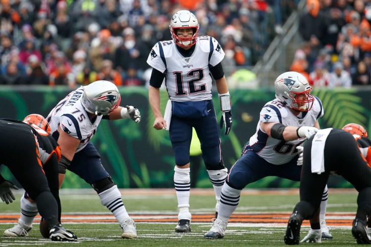 New England Patriots quarterback Tom Brady (12) calls out a play in the first half of an NFL football game against the Cincinnati Bengals, Sunday, Dec. 15, 2019, in Cincinnati. (AP Photo/Frank Victores)