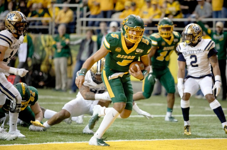North Dakota State quarterback Trey Lance scores a rushing touchdown during the Bison's 4-14 win over Montana State in the FCS semifinals on Saturday in Fargo, North Dakota.