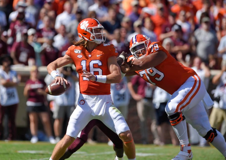 Clemson quarterback Trevor Lawrence became the first freshman quarterback since 1985 to lead his team to the national title last season. He'll try to win another, starting in the semifinals when the Tigers face Ohio State. 