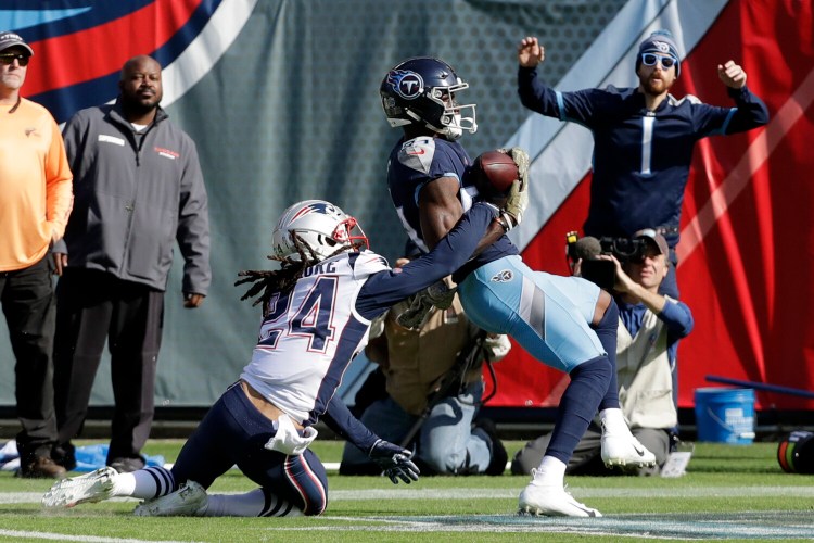 Stephon Gilmore, left, and the Patriots face Corey Davis and the Titans in the first-round of the playoffs on Saturday. The Titans beat the Patriots last season. They have lost to the Chiefs and the Ravens, also possible playoff opponents, this season.