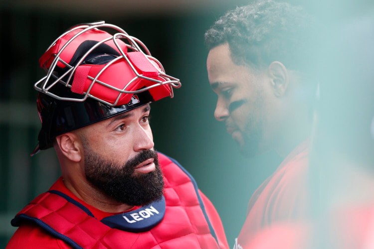 The Boston Red Sox traded catcher Sandy Leon to the Cleveland Indians for minor league pitcher Adenys Bautista.
