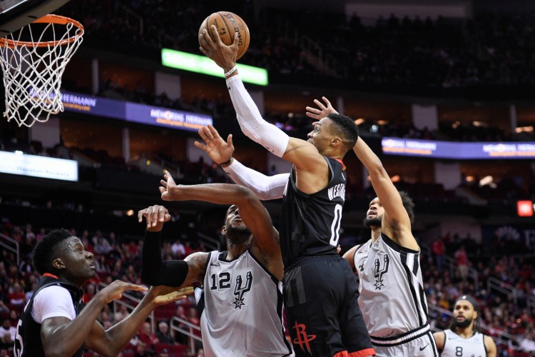 Russell Westbrook scored 31 points and the Houston Rockets rallied from 25 points down to beat the San Antonio Spurs 109-107 on Monday in Houston.