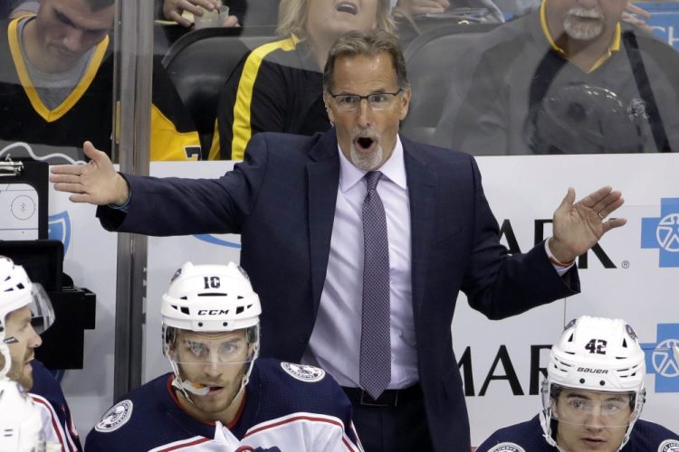 File-This Oct. 5, 2019, file photo shows Columbus Blue Jackets head coach John Tortorella objecting to a call during the first period of an NHL hockey game against the Pittsburgh Penguins in Pittsburgh. A furious post-game rant by Tortorella over clock management in Sunday's night's overtime loss was “unprofessional along with unacceptable,” and NHL official said Monday, Dec.30, 2019. (AP Photo/Gene J. Puskar, File)