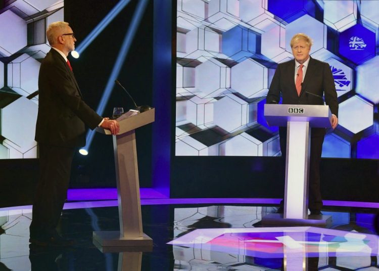 Opposition Labour Party leader Jeremy Corbyn, left, and Britain's Prime Minister Boris Johnson during a debate Friday at the BBC TV studios in Maidstone, England. 