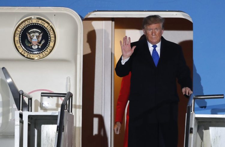President Trump and first lady Melania Trump arrive at Stansted Airport in England on Monday. Trump will join other NATO heads of state at Buckingham Palace in London on Tuesday to mark the NATO Alliance's 70th anniversary.
