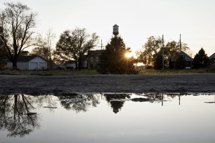 It took only minutes for swift-moving floods from the Elkhorn River to ravage Winslow, Neb., this spring, leaving nearly all its 48 homes and businesses uninhabitable. 