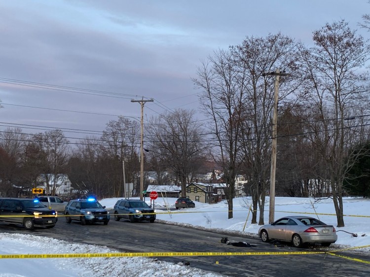 Maine State Police close off the intersection of Route 2 and Route 23 in Canaan where a gunfight erupted between police and a shoplifting suspect Dec. 22.