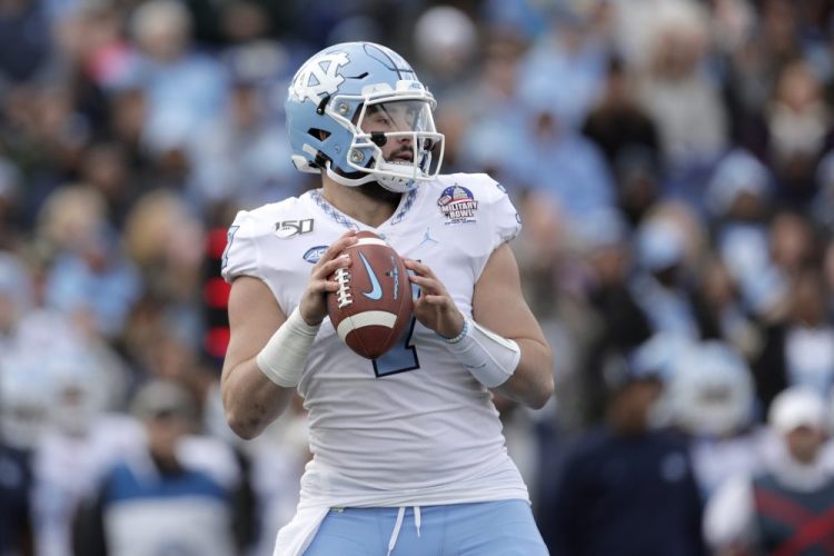 North Carolina quarterback Sam Howell threw for 294 yards and three touchdowns - he caught one as well - and the Tar Heels beat Temple 55-13 in the Military Bowl on Friday in Annapolis, Maryland.