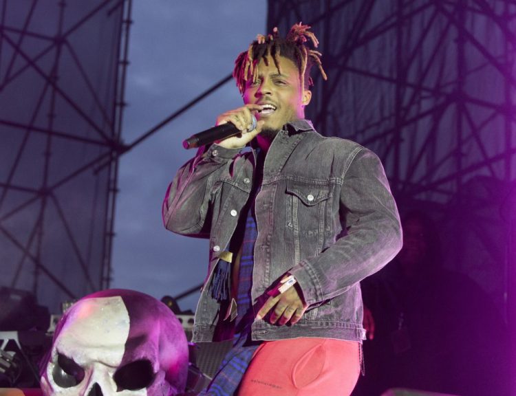 Juice WRLD performs in concert May 15 during his "Death Race for Love Tour" at The Skyline Stage at The Mann Center for the Performing Arts in Philadelphia. The Chicago-area rapper, whose real name is Jarad A. Higgins, was pronounced dead Sunday. Chicago police say they're conducting a death investigation.