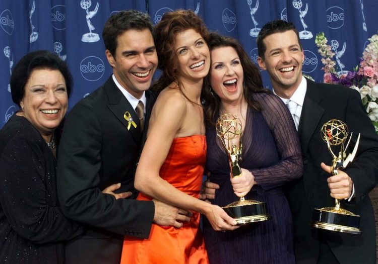 From left: Shelley Morrison, Eric McCormack, Debra Messing, Megan Mullally and Sean Hayes celebrate their awards for their work in "Will & Grace" at the 52nd annual Primetime Emmy Awards in Los Angeles. Morrison, who played the memorable maid Rosario, has died. Publicist Lori DeWaal said Morrison died Sunday at Cedars-Sinai Medical Center in Los Angeles from heart failure. She was 83.