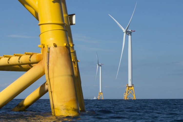 Wind turbines from the Deepwater Wind project stand in the sea off Block Island, R.I., in 2016. A wind farm off the Massachusetts coast is among the projects whose environmental reviews are being fast tracked by the Trump administration.