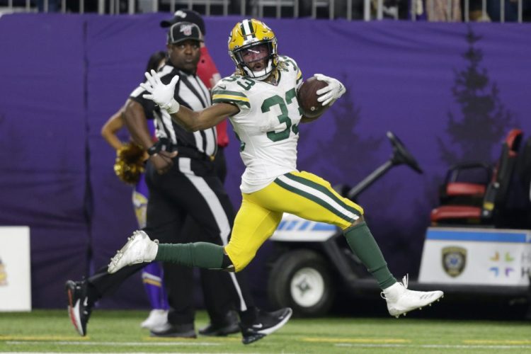 Green Bay running back Aaron Jones finishes a 56-yard touchdown in the second half. 