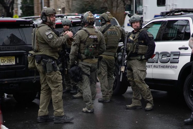 An antiterrorism unit arrives to the scene of a shooting in Jersey City, Tuesday, Dec. 10.