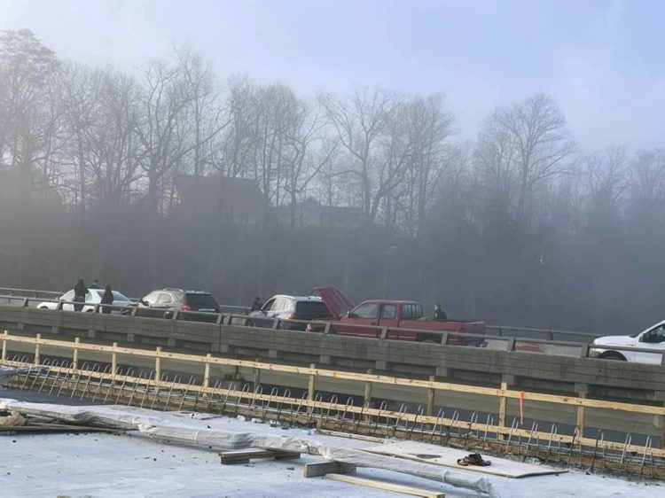 Drivers remain on the scene of a pileup on Interstate 64 in York County, Va., on Sunday.
