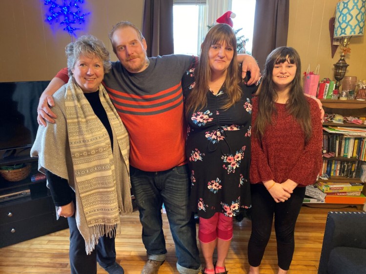 The Rev. Maureen Ausbrook, a minister with the Waterville United Church of Christ, was instrumental in finding shelter for Travis Dobson and Amy and Emily Pinkham. The family said their faith in God helped them through the hard times.