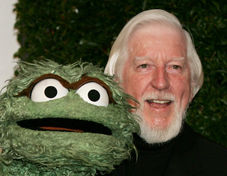 Caroll Spinney, right, who portrayed "Sesame Street" characters Oscar The Grouch, left, and Big Bird, has died at 85. 
