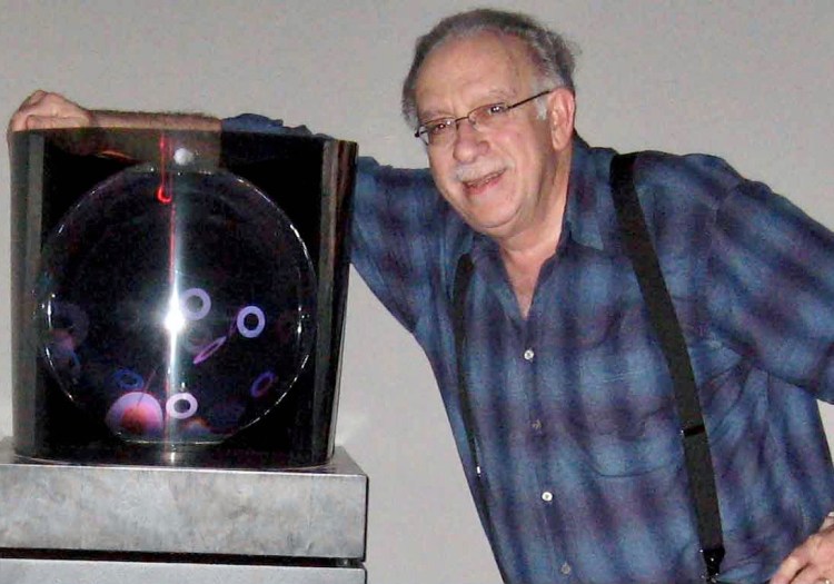 A 2007 photo of Adam Peiperl with a kinetic sculpture.