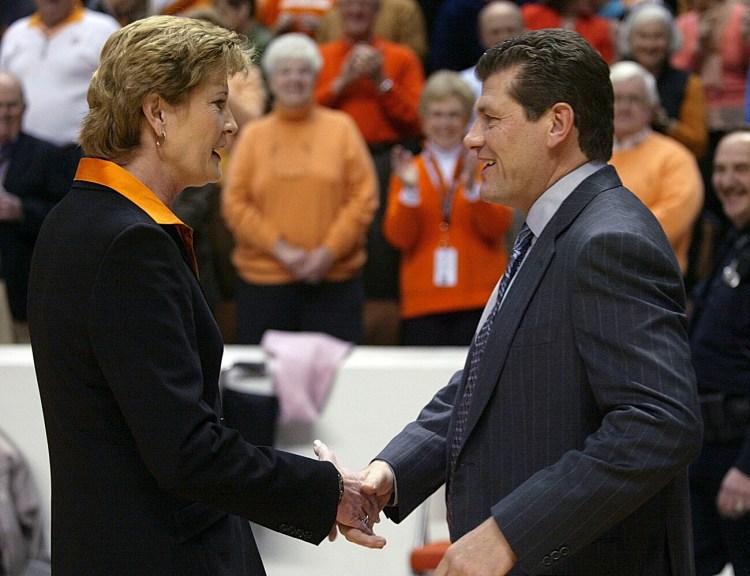 FILE - In this Jan. 7, 2006, file photo, Tennessee coach Pat Summitt, left, shakes hand with Connecticut coach Geno Auriemma before an NCAA college basketball game in Knoxville, Tenn. Connecticut's path to a third straight national championship could include a renewal of the most heated rivalry in women's college basketball. For Auriemma to match Summitt with an eighth national championship he might have to go through her Lady Vols, who earned the top seed in the Dayton region. If both come through their regions, UConn and Tennessee could meet again in the national semifinals at Indianapolis. (AP Photo/Wade Payne, File)