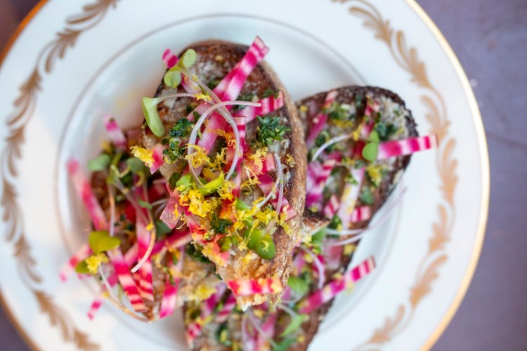 The "Fancy Toast," made with anchovy and shallot butter, chioggia beets and gremolata.
