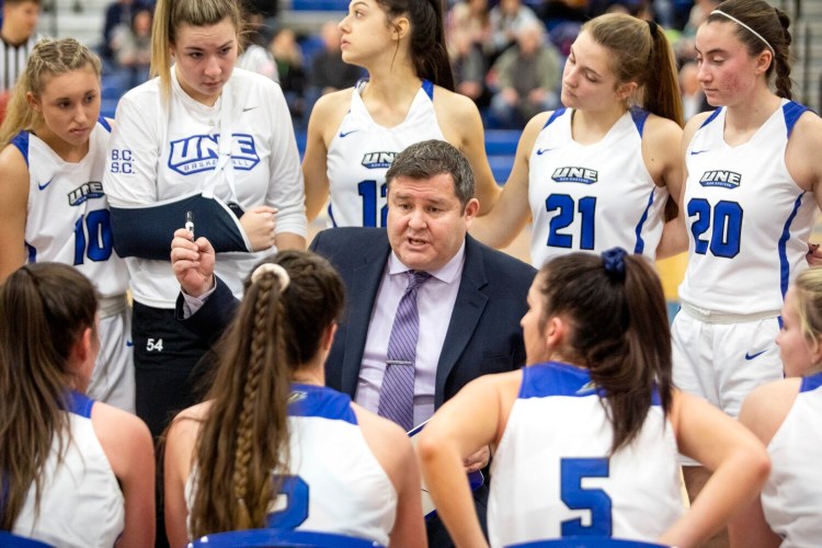 University of New England's Coach Anthony Ewing talks to his team after the third quarter of their game Saturday in Biddeford against Western New England. The Nor'easters lost 53-42 to fall to 12-4, 6-1 in the Commonwealth Coast Conference. 
