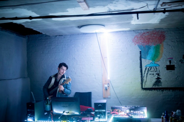 Satchel Butterfield, 17, plays in his basement home studio.  He released a new album, ÒDevolveÓ, on Friday. 