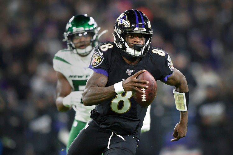 Quarterback Lamar Jackson and the Baltimore Ravens bring a 12-game winning streak into their AFC divisional round game against the Tennessee Titans on Saturday.