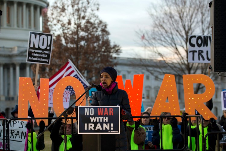 Rep. Ilhan Omar, D-Minn., speaks during the rally outside of the U.S. Capitol, where the House voted to pass a measure limiting President Trump's ability to take military action against Iran, in Washington on Thursday.