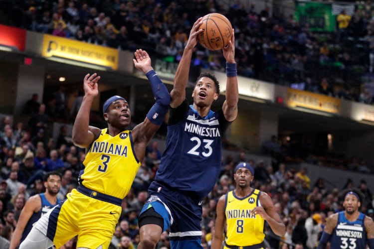 Timberwolves guard Jarrett Culver takes a shot while being defended by Indiana's  Aaron Holiday during Minnesota's 116-114 win on Friday in Indianapolis.